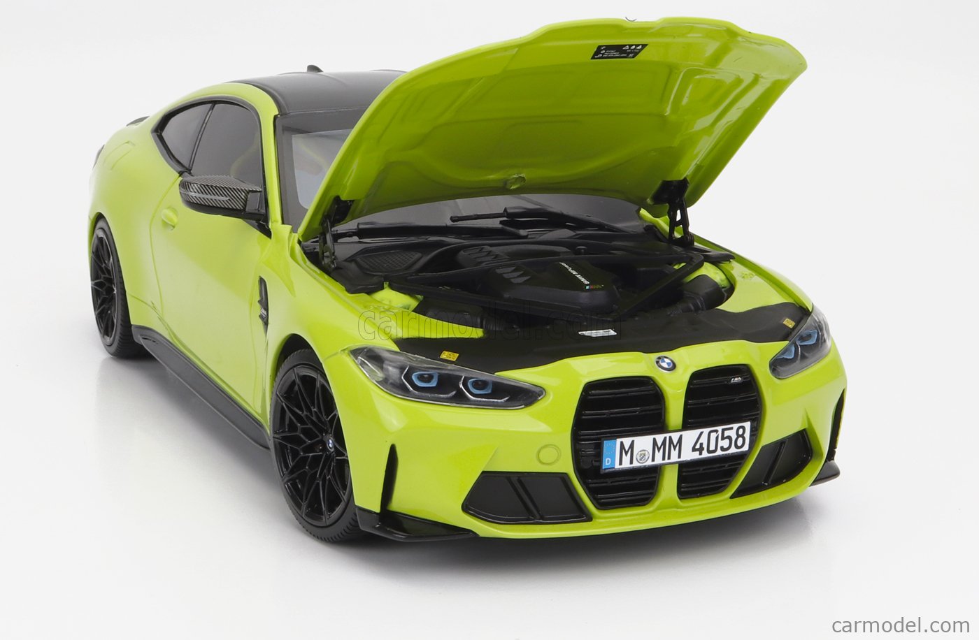 BMW Miniatur M4 (G82), 1:18 (yellow)